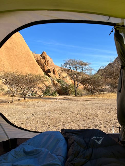 Rooftop Tent 4x4 Tanzania Cost: What Really Changes the Price? 4 View from a camping tent overlooking rocky landscape