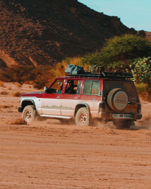 Rent a Car in Arusha Tanzania: What to Check Before You Book 4 4x4 vehicle driving on open adventure terrain